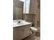 This bathroom has a mirror, tile floors, a sink, a toilet, and a tub at 860 N Orange Ave # 149, Orlando, FL 32801
