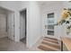 Bright entryway featuring tile flooring, modern door, and neutral decor, creating a welcoming ambiance at 9123 Sommerset Hills Dr, Davenport, FL 33896