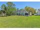 Screened-in pool and patio area in a large backyard at 1120 Parker Canal Ct, Oviedo, FL 32765