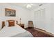 Comfortable bedroom with wood floors, a ceiling fan, and a large closet at 1120 Parker Canal Ct, Oviedo, FL 32765