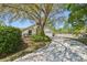 Beautiful home with mature trees and lush landscaping creating curb appeal at 1120 Parker Canal Ct, Oviedo, FL 32765
