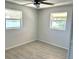 Bright bedroom with ample natural light and tile flooring at 124 Harrison Rd, Daytona Beach, FL 32118