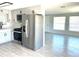 View of the kitchen from the dining area at 124 Harrison Rd, Daytona Beach, FL 32118