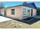 Tan house with nice windows, showing corner view at 124 Harrison Rd, Daytona Beach, FL 32118