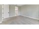 Carpeted bedroom showing view into bright, well-lit on-suite bathroom at 1276 Jackson Hole Ct, Deland, FL 32724