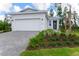 Charming one-story home featuring a well-manicured lawn and a two-car garage at 1276 Jackson Hole Ct, Deland, FL 32724