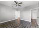 Bedroom featuring a ceiling fan, and wood-look flooring at 13087 Salk Way, Orlando, FL 32827
