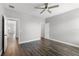 Bedroom featuring a ceiling fan, and wood-look flooring at 13087 Salk Way, Orlando, FL 32827