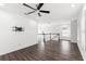 Bonus Room with hardwood floors, ceiling fan and stairway at 13087 Salk Way, Orlando, FL 32827