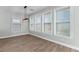 Dining room with hardwood floors and modern lighting at 13087 Salk Way, Orlando, FL 32827