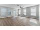 Living room filled with natural light, thanks to the many windows at 13087 Salk Way, Orlando, FL 32827