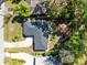 An aerial perspective of the home and roof, surrounded by trees at 1338 Franklin St, Altamonte Springs, FL 32701