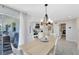 The dining area seamlessly connects with the kitchen and screened patio at 1338 Franklin St, Altamonte Springs, FL 32701