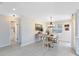 Dining area featuring a table with four chairs and an elegant chandelier at 1338 Franklin St, Altamonte Springs, FL 32701