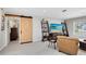 Stylish living room with a sliding barn door and elegant furnishings at 1338 Franklin St, Altamonte Springs, FL 32701