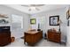 Organized office space boasting hardwood floors, a desk, and ample natural light at 1338 Franklin St, Altamonte Springs, FL 32701