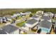 Aerial view showing a neighborhood with modern home styles and private pools for select residences at 14004 Gullstrand Ave, Orlando, FL 32827