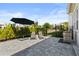 Backyard featuring an outdoor grill, seating, and a well maintained hedge at 14004 Gullstrand Ave, Orlando, FL 32827