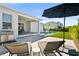 Backyard featuring an outdoor grill, seating, and a pool at 14004 Gullstrand Ave, Orlando, FL 32827