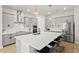 Modern kitchen with white countertops, grey cabinets, stainless steel appliances, and pendant lighting at 14004 Gullstrand Ave, Orlando, FL 32827
