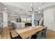 Open-concept living space featuring a modern kitchen, dining area, and inviting living room, all with stylish decor at 14004 Gullstrand Ave, Orlando, FL 32827