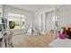 Bright playroom with natural light, neutral decor, and an open concept feel at 14004 Gullstrand Ave, Orlando, FL 32827