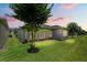 Well-maintained backyard with lush lawn and beautiful landscaping at 1686 Victoria Gardens Dr, Deland, FL 32724