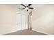 Light bedroom with ceramic floors, ceiling fan, and double closets offering lots of space at 1686 Victoria Gardens Dr, Deland, FL 32724