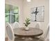 Cozy dining nook features natural light and modern decor for comfortable meals at 1686 Victoria Gardens Dr, Deland, FL 32724