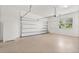 Spacious two-car garage provides ample room for parking and storage at 1686 Victoria Gardens Dr, Deland, FL 32724