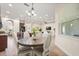 The open concept kitchen and dining area is ideal for entertaining and enjoying meals together at 1686 Victoria Gardens Dr, Deland, FL 32724
