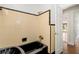 Updated bathroom featuring a black soaking tub and contrasting tile work at 1701 Palmer Ave, Winter Park, FL 32789