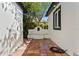 Private courtyard area featuring tiled flooring and a charming decorative water feature at 1701 Palmer Ave, Winter Park, FL 32789