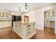 Kitchen features a large island with granite countertops and plenty of storage space at 1701 Palmer Ave, Winter Park, FL 32789