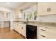 Kitchen area features granite countertops, black appliances, and a window with a view of the outside at 1701 Palmer Ave, Winter Park, FL 32789