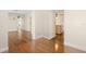Open-concept living room with hardwood floors and a view of the adjacent rooms at 1701 Palmer Ave, Winter Park, FL 32789