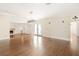 Open living room with bright, natural light, fireplace, and hardwood flooring at 1701 Palmer Ave, Winter Park, FL 32789