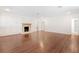 Spacious living room features hardwood floors, built-in cabinets and fireplace at 1701 Palmer Ave, Winter Park, FL 32789