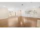Open-concept living room with hardwood floors and views of multiple rooms at 1701 Palmer Ave, Winter Park, FL 32789