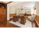Home office with hardwood floors, a wooden desk, and built-in shelves and storage at 1701 Palmer Ave, Winter Park, FL 32789