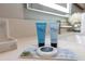 Close-up of bathroom amenities including shampoo, conditioner, and soap at 17522 Hidden Forest Dr, Clermont, FL 34714