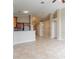 Open layout showcasing eat-in kitchen area that blends seamlessly into the living room space at 2104 Remington Pointe Blvd, Kissimmee, FL 34743