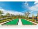 Well-maintained bocce ball courts in a beautifully landscaped outdoor recreational area at 2168 Seagrass Pt # 424, Kissimmee, FL 34747