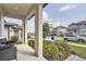 View from the front porch, showing the neighborhood street and well-kept surroundings at 2277 Crossbow St, Clermont, FL 34715