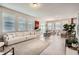 Spacious living area with open floor plan connected to the kitchen and dining room at 2277 Crossbow St, Clermont, FL 34715