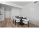 Dining area with elegant seating around a sleek table, perfect for dinner parties at 231 Riverside Dr # 708, Daytona Beach, FL 32117
