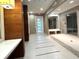 Hallway featuring tiled floors, neutral paint and decorative lighting at 231 Riverside Dr # 708, Daytona Beach, FL 32117