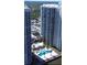 Aerial shot of a high-rise condo with a pool and parking garage at 231 Riverside Dr # 708, Daytona Beach, FL 32117