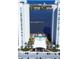 Stunning aerial view showcasing the community pool, waterfront, and boat dock access from this high rise building at 231 Riverside Dr # 708, Daytona Beach, FL 32117