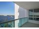 Beautiful balcony with stunning water views and glass railings, perfect for relaxation and enjoying the scenery at 231 Riverside Dr # 708, Daytona Beach, FL 32117